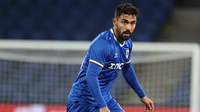 Gus Scott-Morriss's red card against Colchester United has been overturned on appeal, sparing the Oldham defender a...